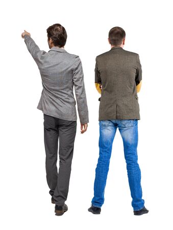 Back view of  two business men in suit pointing. Rear view people collection. backside view of person. Isolated over white background.の写真素材