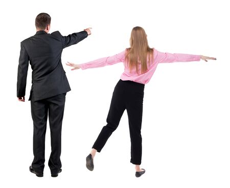 Back view of business man and business woman in suit pointing. Business team. Rear view people collection. backside view of person. Isolated over white background.の写真素材