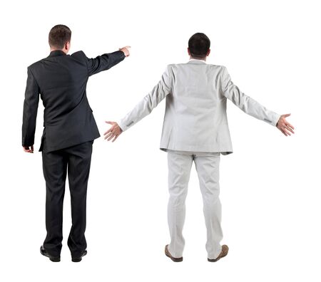 Back view of business man and business woman in suit pointing. Business team. Rear view people collection. backside view of person. Isolated over white background.の写真素材