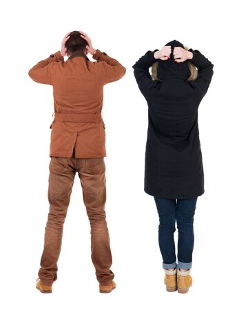 Back view of couple in winter jacket. beautiful friendly girl and guy together. Rear view people collection. backside view of person. Isolated over white background.の写真素材
