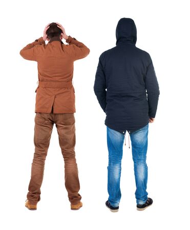 Back view of couple in winter jacket. beautiful friendly girl and guy together. Rear view people collection. backside view of person. Isolated over white background.の写真素材