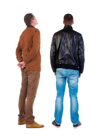 Back view of couple in winter jacket. beautiful friendly girl and guy together. Rear view people collection. backside view of person. Isolated over white background.の写真素材