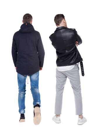 Back view of couple in winter jacket. beautiful friendly girl and guy together. Rear view people collection. backside view of person. Isolated over white background.の写真素材