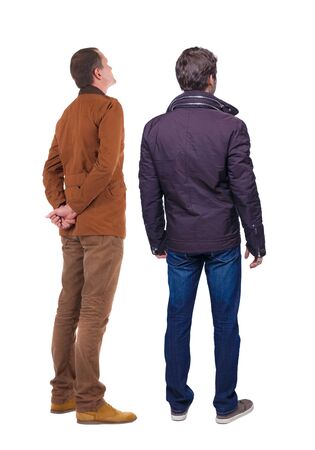 Back view of couple in winter jacket. beautiful friendly girl and guy together. Rear view people collection. backside view of person. Isolated over white background.の写真素材