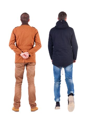 Back view of couple in winter jacket. beautiful friendly girl and guy together. Rear view people collection. backside view of person. Isolated over white background.の写真素材