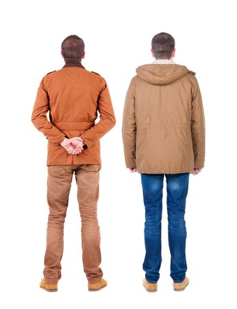Back view of couple in winter jacket. beautiful friendly girl and guy together. Rear view people collection. backside view of person. Isolated over white background.の写真素材