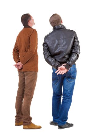 Back view of couple in winter jacket. beautiful friendly girl and guy together. Rear view people collection. backside view of person. Isolated over white background.の写真素材