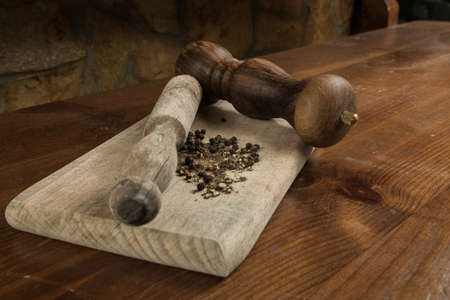 Black pepper with vintage millの写真素材