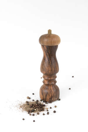 Black pepper with vintage millの写真素材