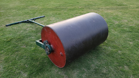A large cylindrical object on green grass.の写真素材