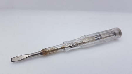 Screwdriver on a white background, close-up, isolated