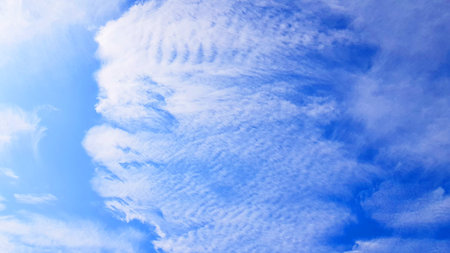 Blue sky background with tiny clouds. Blue sky with tiny clouds.