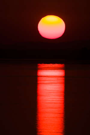 sunset lake in tanzanian savannah