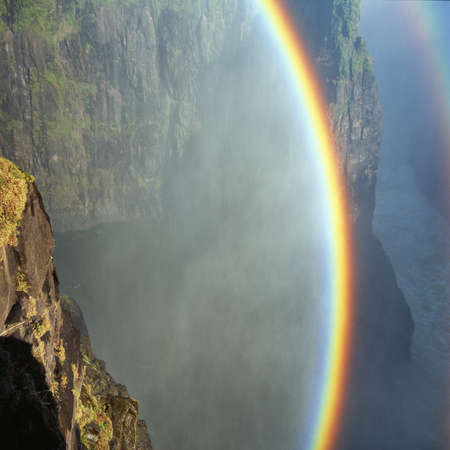 a rainbow near waterfall Victoria