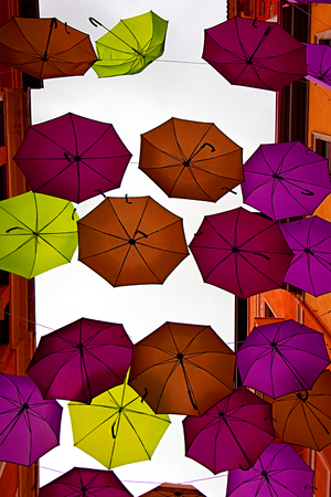 Colorful umbrellas near Sardiniaの写真素材