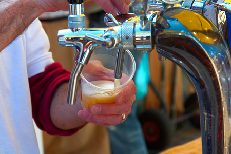 Draft beer on a typical Tuscan partyの写真素材