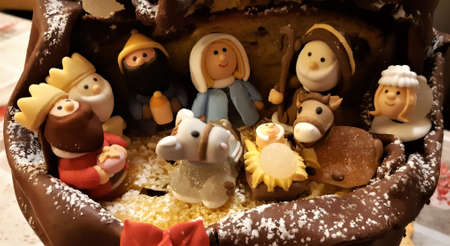 Chocolate cake with crib made of sugarの写真素材