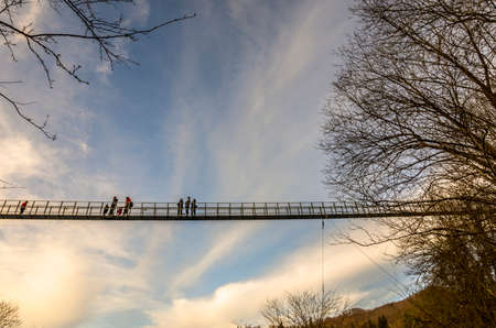 Overview of the suspension bridge seen from belowの写真素材