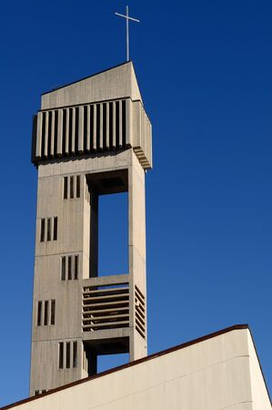 Cross and bell towerの写真素材