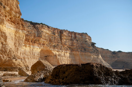 Rock formations on the Algarve coast in Portugalの写真素材