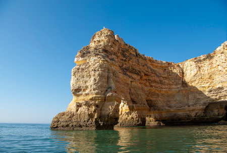 Rock formations on the Algarve coast in Portugalの写真素材