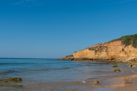 Maria Luisa beach with rock formation in Albufeira, Algarve, Portugal.の写真素材
