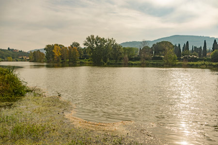 The Arno River at the gates of Florence, Italyの写真素材