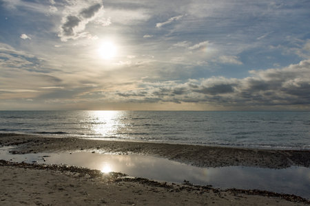 Sunset on the beach of Tuscany, Italy.の写真素材