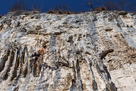 Climber looking for the right way to goの写真素材