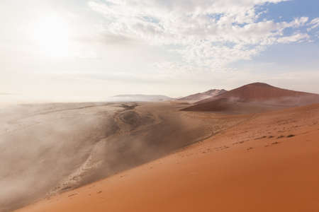 The fog retreats in the desert of Namibiaの写真素材