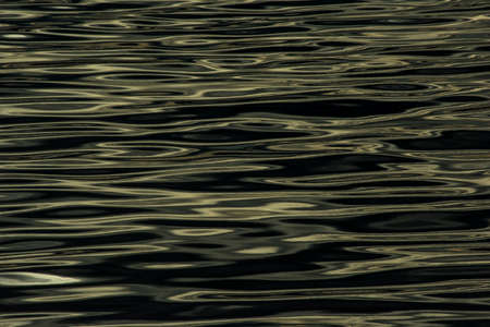 Reflections of the sunset on the sea - Costa Smeralda (Sardinia)の写真素材