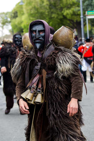 MURAVERA, ITALIA - APRILE 2, 2017:  45^ Sagra degli agrumi - Mamuthones di Mamoiada - Sardegnaのeditorial素材