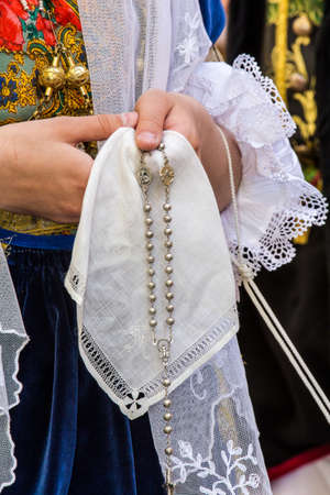 CAGLIARI, ITALY - MAY 1, 2016: 360 Feast of Sant'Efisio, detail of a lace handkerchief - Sardinia