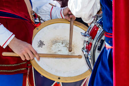 CAGLIARI, ITALY - OCTOBER 29, 2016: Invitas, Porto promenade, Sardinia of traditions, performances and food - Tamburini parade and flag bearers of Iglesiasのeditorial素材