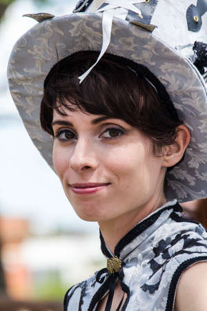 CAGLIARI, Italy - JUNE 1, 2014: Sunday at La Grande Jatte, public gardens, portrait of a beautiful woman in Victorian costume - Sardiniaのeditorial素材