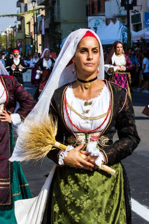 SELARGIUS, ITALY - SEPTEMBER 11, 2016: Old Selargino wedding, parade of traditional Sardinian costumes - Sardiniaのeditorial素材