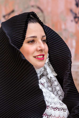 CAGLIARI, ITALY - MAY 1, 2016: 360 Feast of Sant'Efisio, portrait of a beautiful woman wearing a traditional Sardinian costume - Sardiniaのeditorial素材