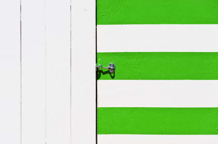 white and green banded cabana beachの写真素材