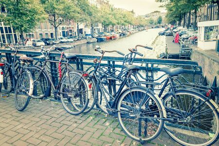 Amsterdam canal and bicyclesの写真素材