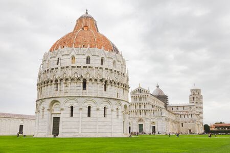 Baptistery, Cathedral and Leaning Tower in the Piazza dei Miracoli (Square of Miracles), Pisa, Tuscany, Italyの写真素材