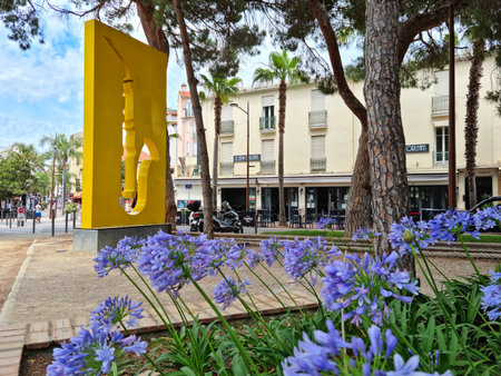 Juan les Pins, France - 28 June, 2021: People walking in the park called La Pinede. The city is famous for its summer jazz festival.のeditorial素材