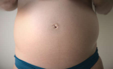 Belly of a pregnant womanの写真素材