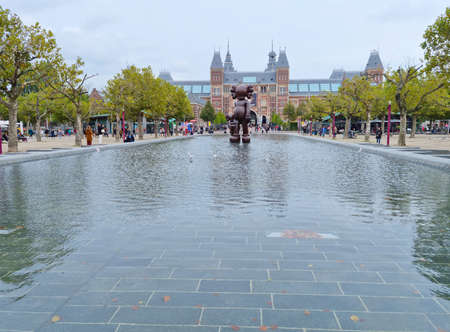 Amsterdam, The Netherlands - 02 October, 2021: People walking in the Museum Square in from of the Rijksmuseum. The museum is in the Amsterdam South, close to the Van Gogh and Stedelijk Museums.のeditorial素材
