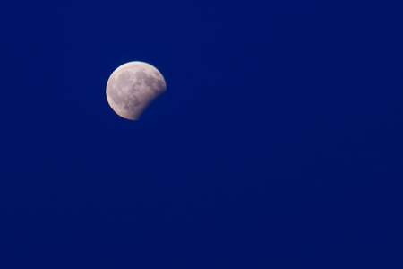 Partial moon eclipseの写真素材