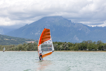 FARRA D'ALPAGO, ITALY  JUNE 30, 2017: 2017 windsurf world championship. Concurrent training before the raceのeditorial素材
