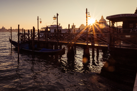 VENICE, ITALY - JANUARY 02 2018: The hotel Cipriani  jetty with gondolas at sunset. Cipriani is one of most important city hotelsのeditorial素材