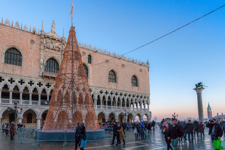 VENICE, ITALY - JANUARY 02 2018: the  Christmas Tree in front of Palazzo Ducale at the sunsetのeditorial素材