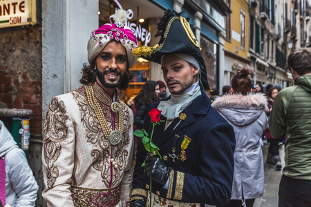 VENICE, ITALY - FEBRUARY  09 2018: Pair of carnival masks posing for photographersのeditorial素材