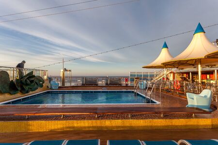 View of the indoor pool in the upper deck of a cruise shipのeditorial素材