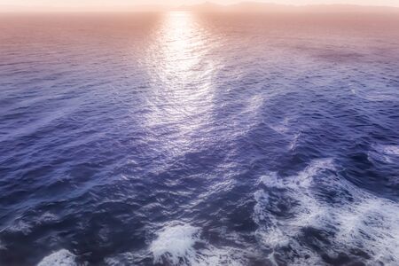 Magical sunset reflections over the sea with islands of Saronic Gulf background
